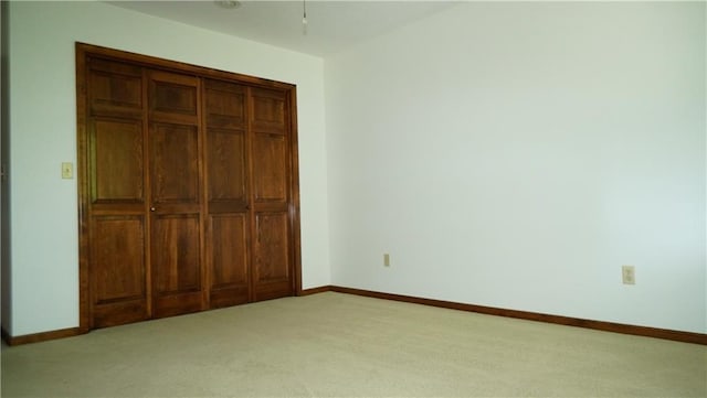 5500 NW 62nd St, Kansas City, MO 64151 - unfurnished bedroom featuring carpet floors, baseboards, and a closet
