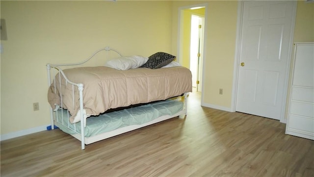 5500 NW 62nd St, Kansas City, MO 64151 - bedroom with wood finished floors and baseboards