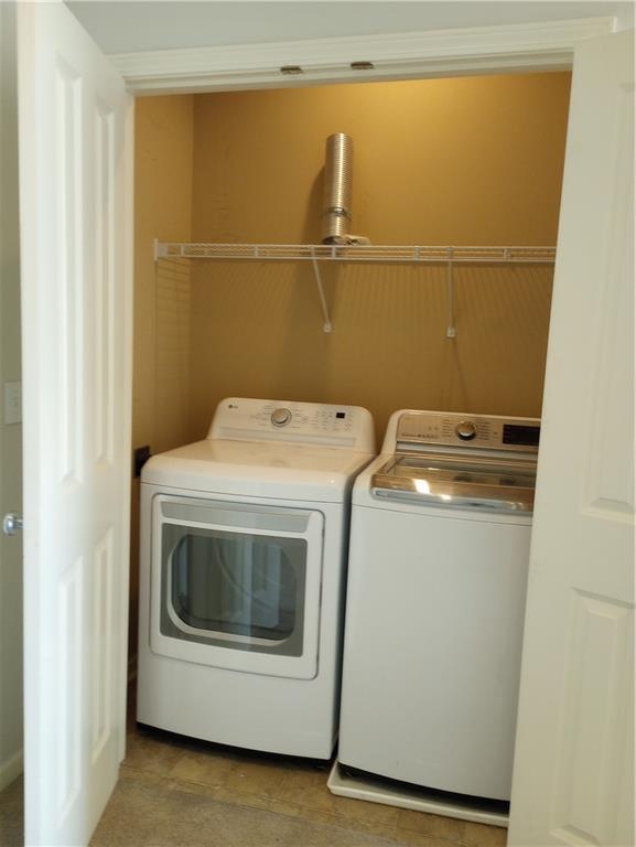 15829 W Robinson St, Overland Park, KS 66223 - laundry room featuring washing machine and clothes dryer
