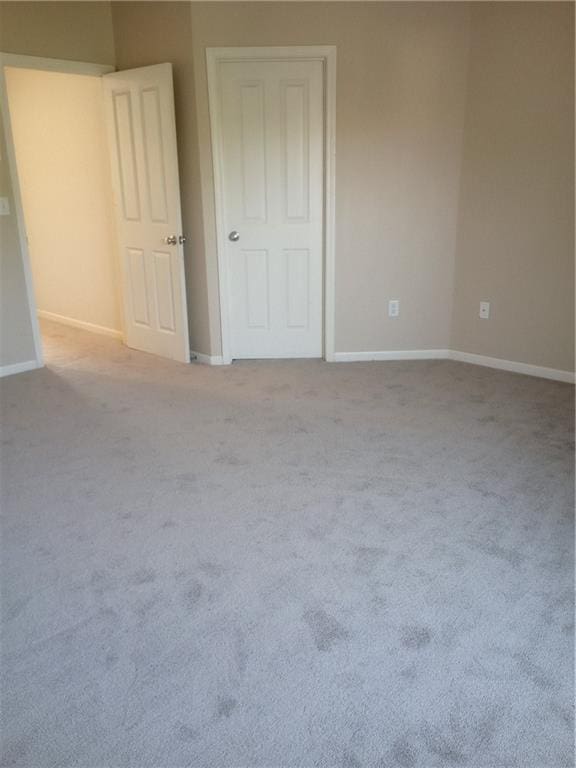 15829 W Robinson St, Overland Park, KS 66223 - unfurnished bedroom with baseboards and carpet floors