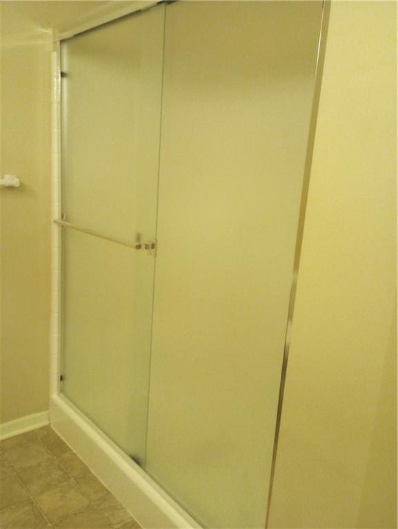 15829 W Robinson St, Overland Park, KS 66223 - full bath featuring a shower stall and baseboards
