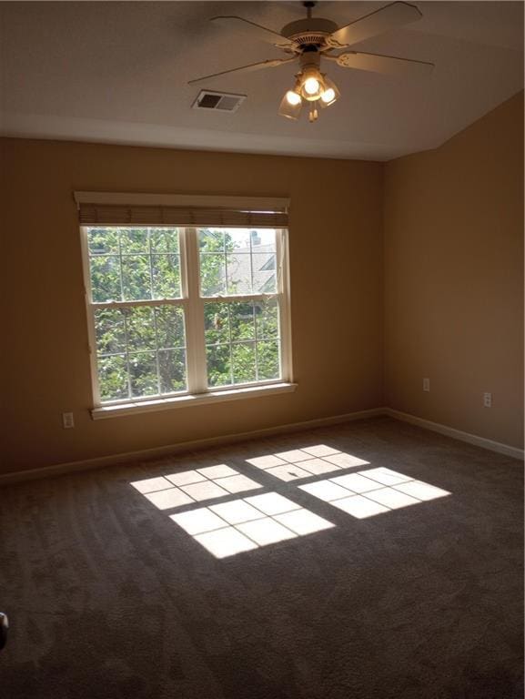 15829 W Robinson St, Overland Park, KS 66223 - spare room featuring carpet, baseboards, and a ceiling fan