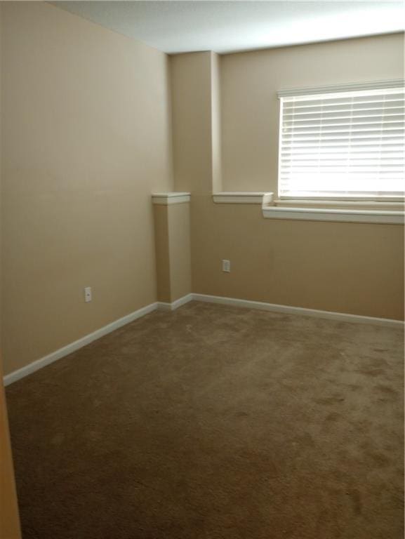 15829 W Robinson St, Overland Park, KS 66223 - carpeted spare room with baseboards