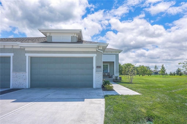 24129 W 95th St, Lenexa, KS 66227 - view of front of property featuring stone siding, stucco siding, concrete driveway, and a front lawn