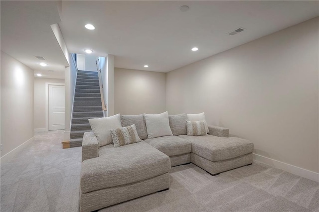 24129 W 95th St, Lenexa, KS 66227 - living area featuring light colored carpet, recessed lighting, baseboards, and stairway