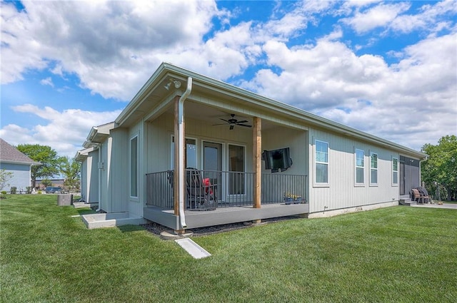 24129 W 95th St, Lenexa, KS 66227 - back of property featuring ceiling fan and a lawn