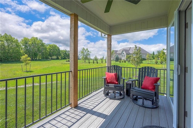 24129 W 95th St, Lenexa, KS 66227 - deck with a ceiling fan and a lawn