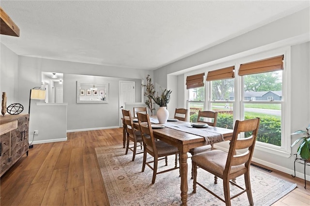 6525 County Line Rd, Shawnee, KS 66216 - dining space featuring light wood finished floors and baseboards