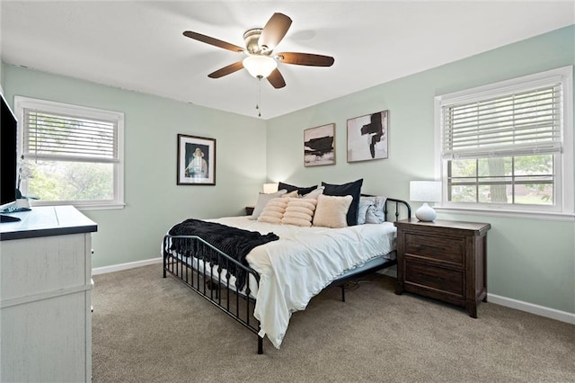 6525 County Line Rd, Shawnee, KS 66216 - bedroom featuring light colored carpet and a ceiling fan