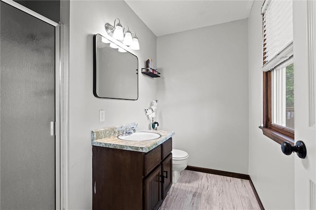 6525 County Line Rd, Shawnee, KS 66216 - full bath with vanity, a shower stall, and wood finished floors