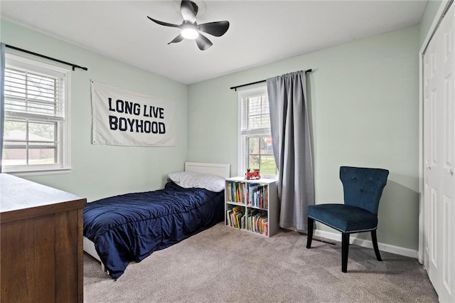 6525 County Line Rd, Shawnee, KS 66216 - bedroom featuring a closet, carpet, and a ceiling fan