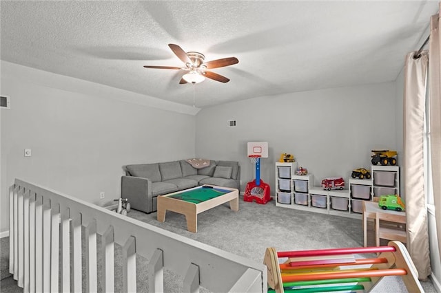 6525 County Line Rd, Shawnee, KS 66216 - rec room featuring carpet floors, ceiling fan, and a textured ceiling