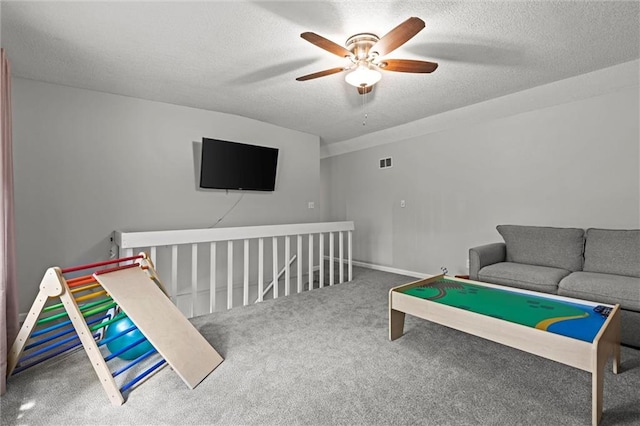 6525 County Line Rd, Shawnee, KS 66216 - living area featuring carpet, a ceiling fan, and a textured ceiling
