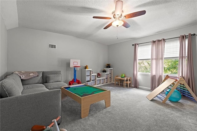 6525 County Line Rd, Shawnee, KS 66216 - rec room with a ceiling fan, a textured ceiling, carpet floors, and lofted ceiling