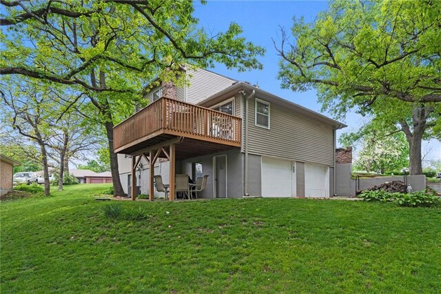 6525 County Line Rd, Shawnee, KS 66216 - rear view of house with a garage, a deck, and a yard