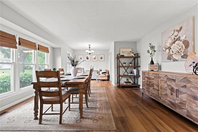 6525 County Line Rd, Shawnee, KS 66216 - dining room with a chandelier and wood finished floors