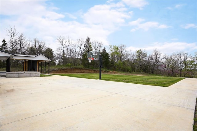24905 W 57th St, Shawnee, KS 66226 - view of patio / terrace with basketball court and concrete driveway
