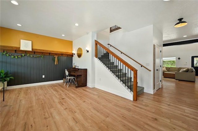 24905 W 57th St, Shawnee, KS 66226 - interior space featuring wood finished floors, stairway, recessed lighting, and baseboards