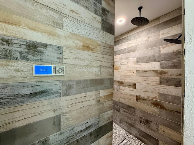 24905 W 57th St, Shawnee, KS 66226 - bathroom with wood walls and a tile shower