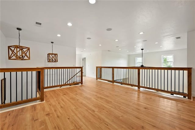 24905 W 57th St, Shawnee, KS 66226 - unfurnished room with light wood-type flooring and recessed lighting