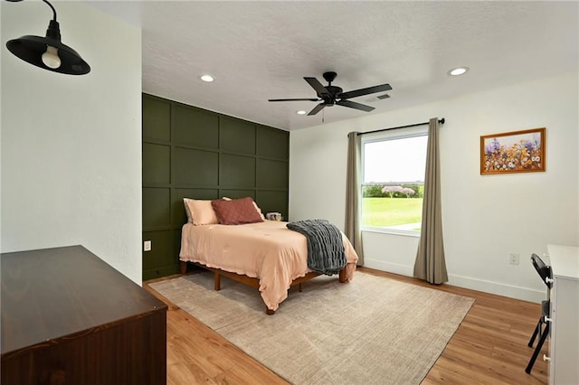 24905 W 57th St, Shawnee, KS 66226 - bedroom featuring recessed lighting, light wood-style flooring, baseboards, and ceiling fan