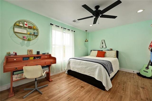24905 W 57th St, Shawnee, KS 66226 - bedroom featuring wood finished floors, recessed lighting, baseboards, and ceiling fan