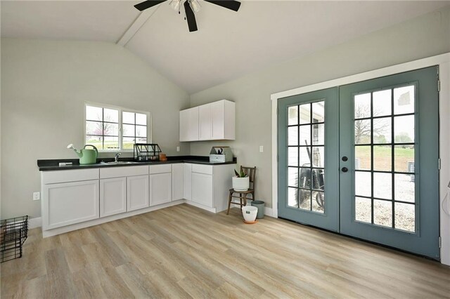 24905 W 57th St, Shawnee, KS 66226 - kitchen with french doors, light wood-style floors, ceiling fan, and dark countertops