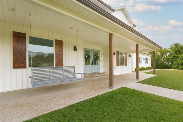 24905 W 57th St, Shawnee, KS 66226 - covered porch with french doors and a yard