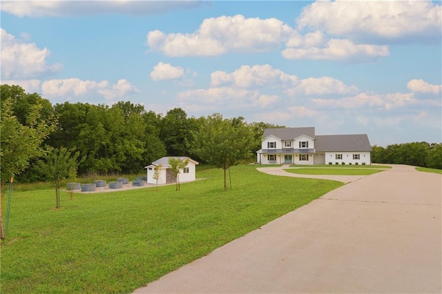 24905 W 57th St, Shawnee, KS 66226 - view of green lawn featuring an outbuilding