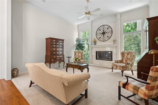 14913 W 72nd St, Shawnee, KS 66216 - living room featuring a fireplace, crown molding, ceiling fan, and wood finished floors