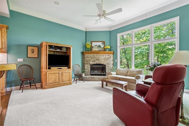 14913 W 72nd St, Shawnee, KS 66216 - living room featuring crown molding, a fireplace, and a ceiling fan
