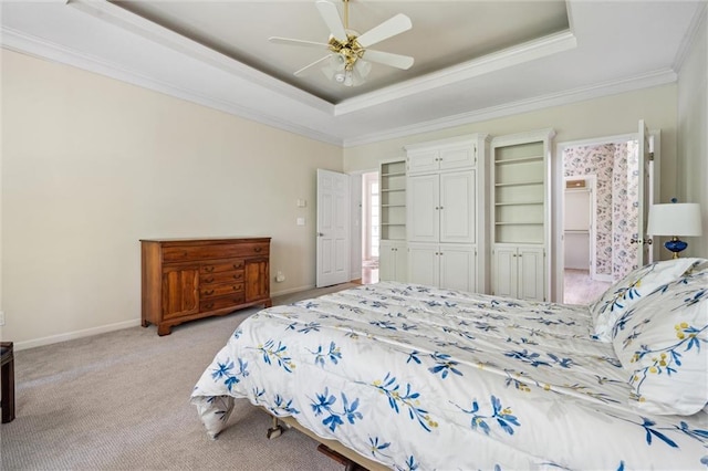 14913 W 72nd St, Shawnee, KS 66216 - bedroom featuring a raised ceiling, light colored carpet, ornamental molding, ceiling fan, and a closet