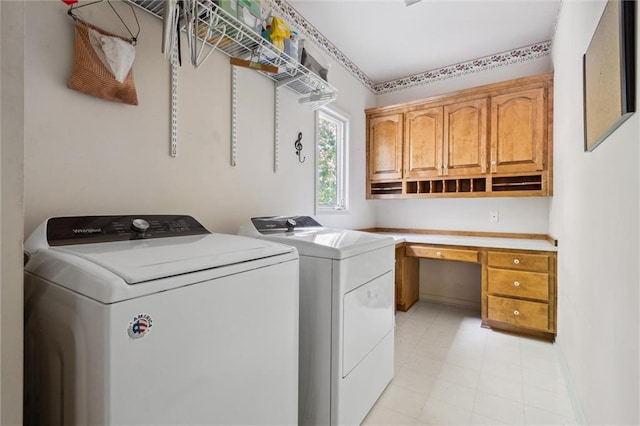 14913 W 72nd St, Shawnee, KS 66216 - laundry room with washer and dryer, cabinet space, and a desk