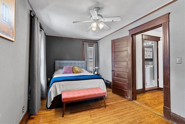 1405 W 40th St, Kansas City, MO 64111 - bedroom featuring light wood-style floors and a ceiling fan