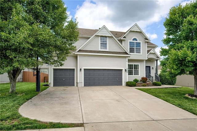 2208 SW Hawk View Rd, Lees Summit, MO 64082 - view of front of property with a garage, driveway, and a shingled roof