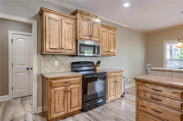2208 SW Hawk View Rd, Lees Summit, MO 64082 - kitchen featuring stainless steel microwave, black range with electric cooktop, light wood-style flooring, backsplash, and light countertops