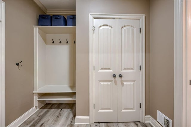 2208 SW Hawk View Rd, Lees Summit, MO 64082 - mudroom featuring wood finished floors and baseboards