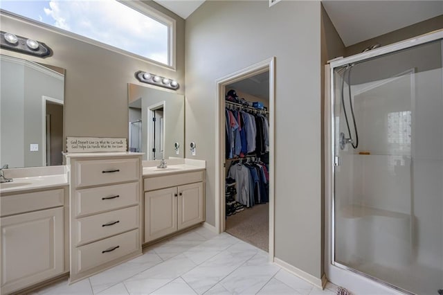 2208 SW Hawk View Rd, Lees Summit, MO 64082 - full bathroom with a stall shower, vanity, a spacious closet, and marble finish floors