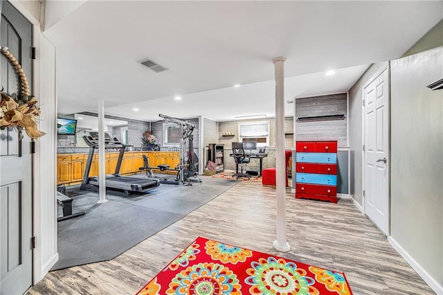 7905 W 129th St, Overland Park, KS 66213 - workout room featuring wood finished floors and recessed lighting