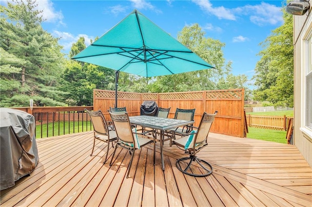 7905 W 129th St, Overland Park, KS 66213 - wooden deck featuring outdoor dining space and grilling area