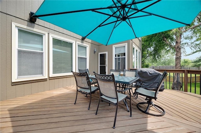 7905 W 129th St, Overland Park, KS 66213 - wooden deck with outdoor dining area