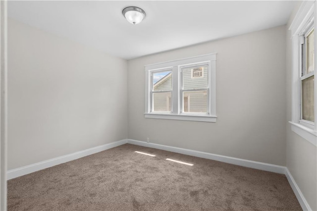 2100 S Scott Ave, Independence, MO 64052 - unfurnished room with carpet flooring and baseboards