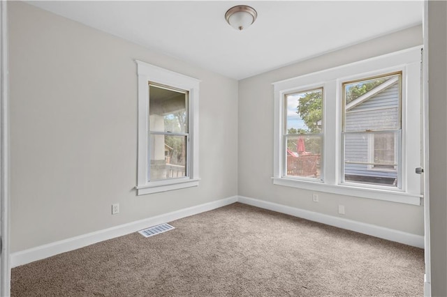 2100 S Scott Ave, Independence, MO 64052 - spare room with carpet and baseboards