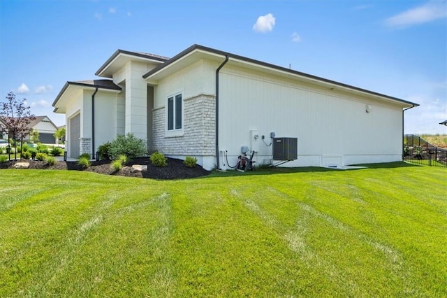 9412 Aurora St, Lenexa, KS 66220 - view of side of home with central AC unit