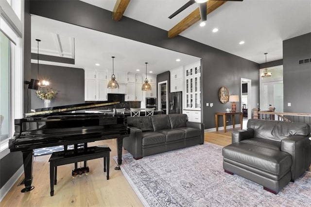 9412 Aurora St, Lenexa, KS 66220 - living area with light wood-style flooring, ceiling fan, beam ceiling, recessed lighting, and baseboards