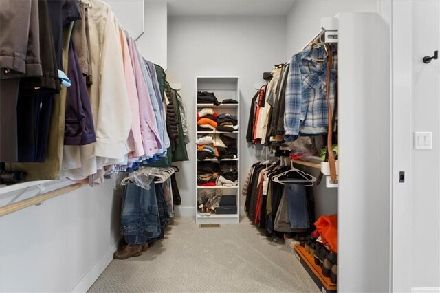 9412 Aurora St, Lenexa, KS 66220 - walk in closet featuring carpet flooring