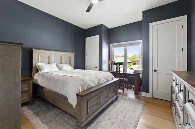 9412 Aurora St, Lenexa, KS 66220 - bedroom with light wood-style floors, a ceiling fan, and access to outside