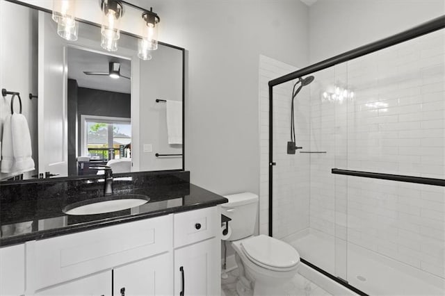 9412 Aurora St, Lenexa, KS 66220 - full bath with marble look tiles, vanity, a stall shower, and toilet