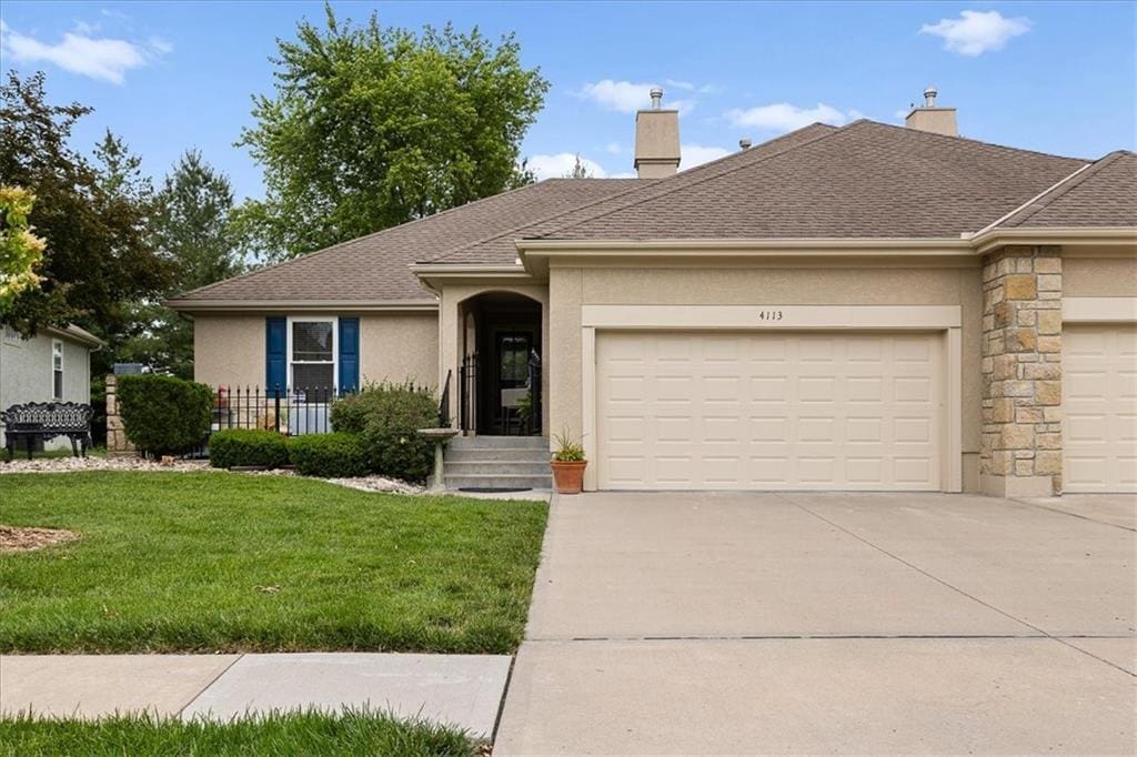 4113 SW Homestead Dr, Lees Summit, MO 64082 - ranch-style house with an attached garage, stucco siding, a front yard, driveway, and a shingled roof