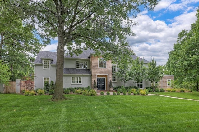 1055 W 54th St, Kansas City, MO 64112 - view of front of house featuring a shingled roof